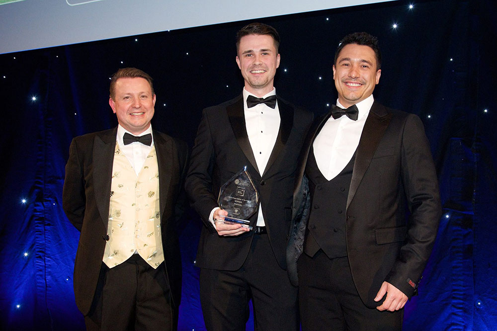 InfoTrack staff accepting award win at British Conveyancing Awards